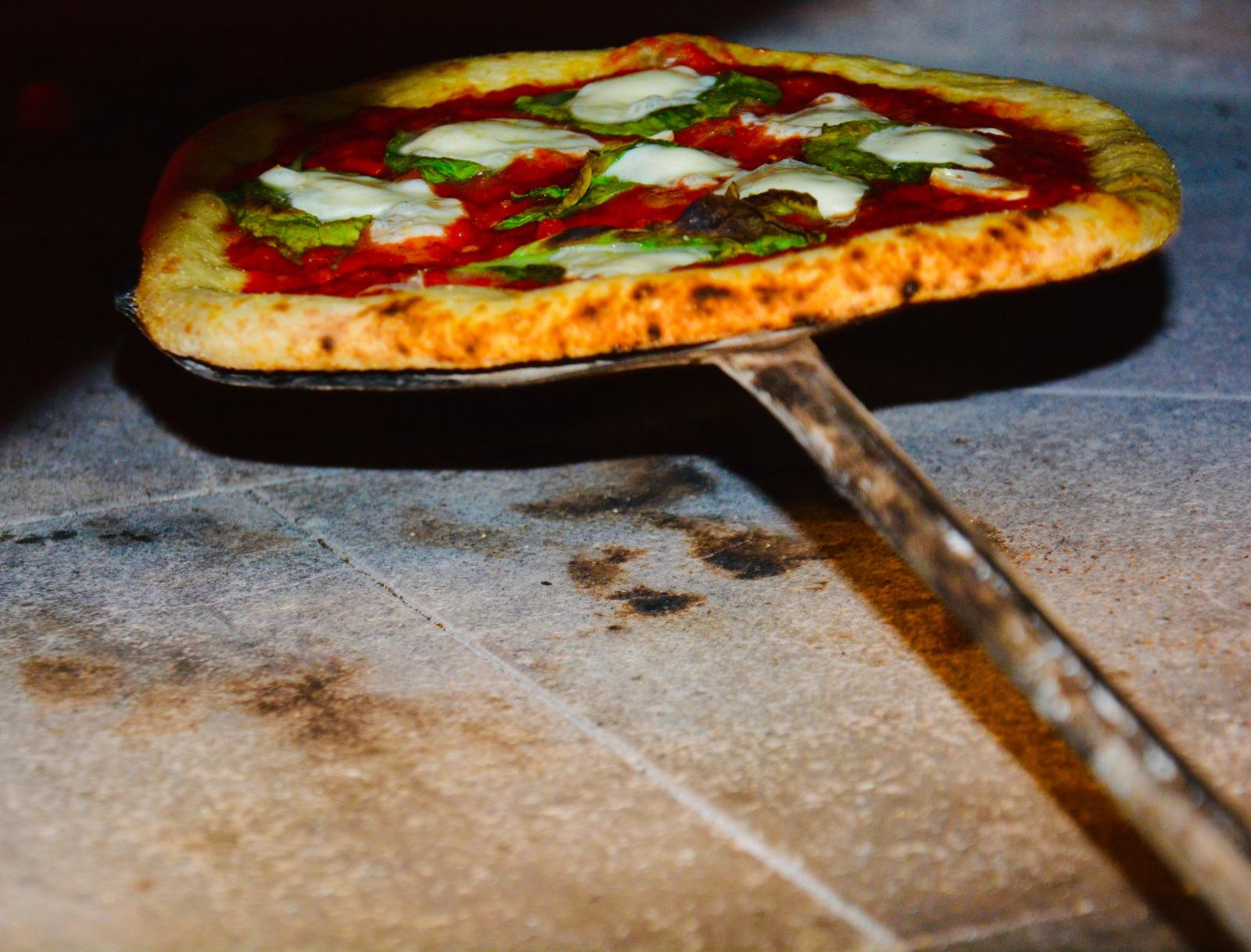Margherita pizza on the peel